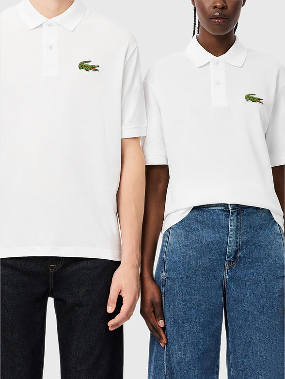 Unisex polo shirt in black - 1