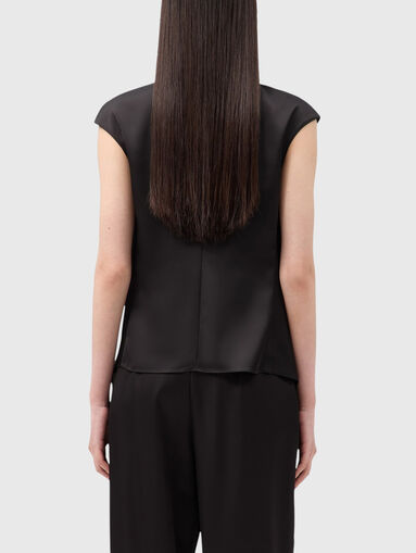 Black top with a zip on the back - 3