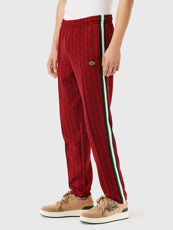 Sports trousers with monogram print - 3