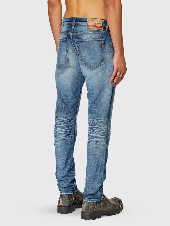 Jeans with washed effect and accent rips - 2