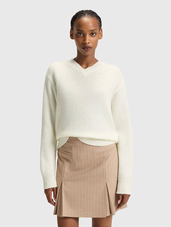 Wool sweater with V-neck and accent back - 1