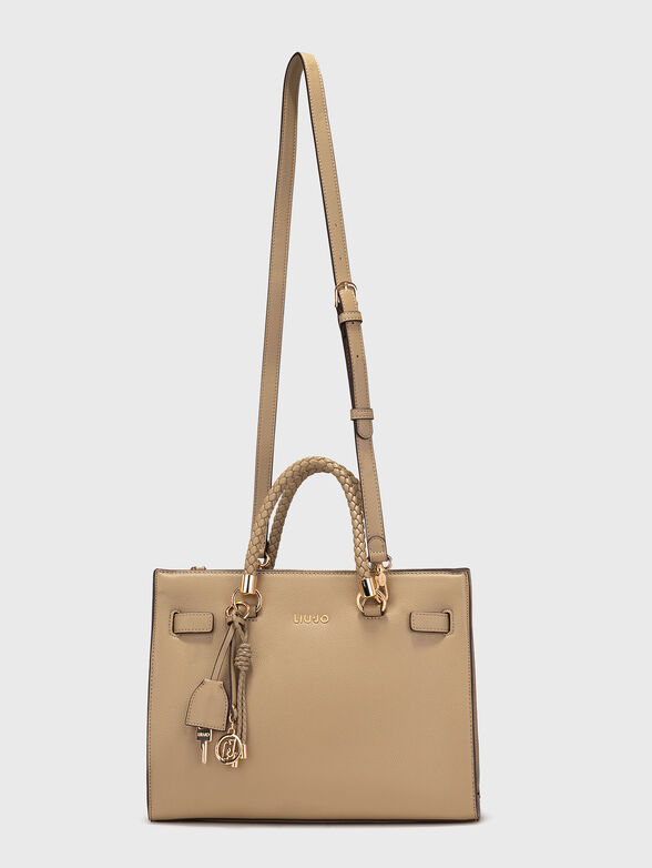 Leather bag with golden logo accent - 2