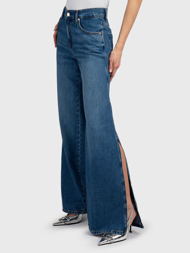Flared jeans with side slits - 3