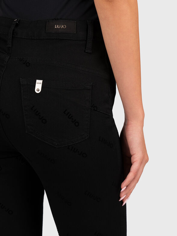 High-waisted black jeans - 3