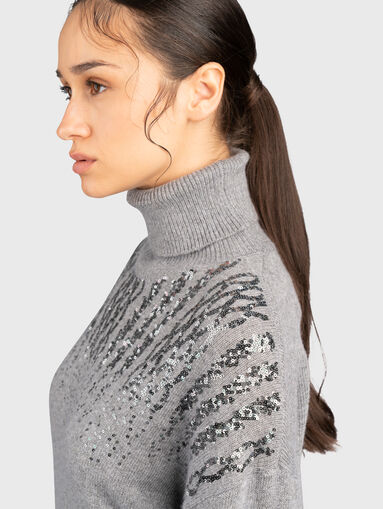 Black dress with sequins and polo collar - 4