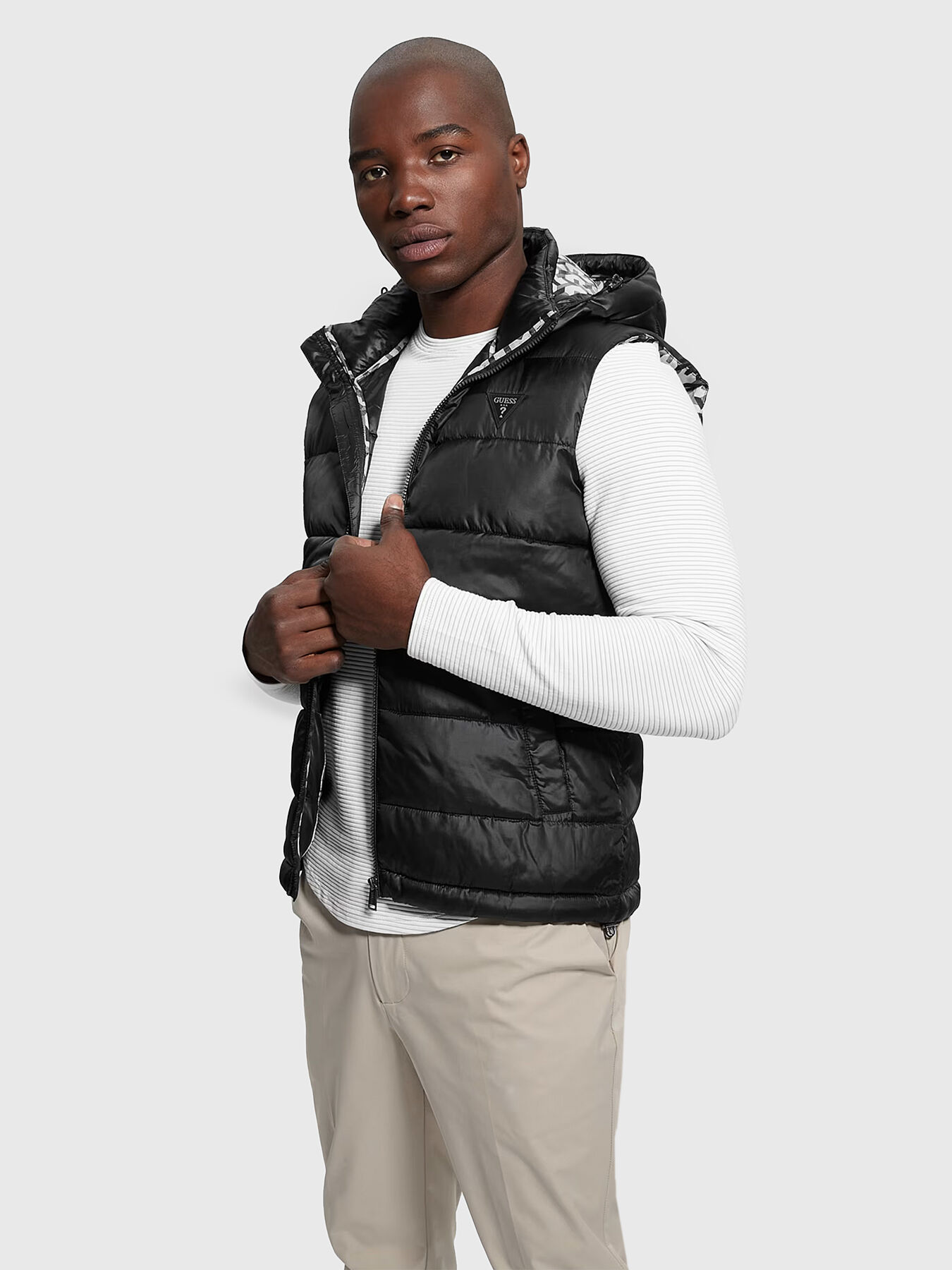 Black puffer vest brand GUESS — Globalbrandsstore.com/en