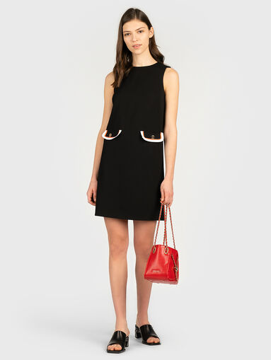 Black dress with contrasting details - 5