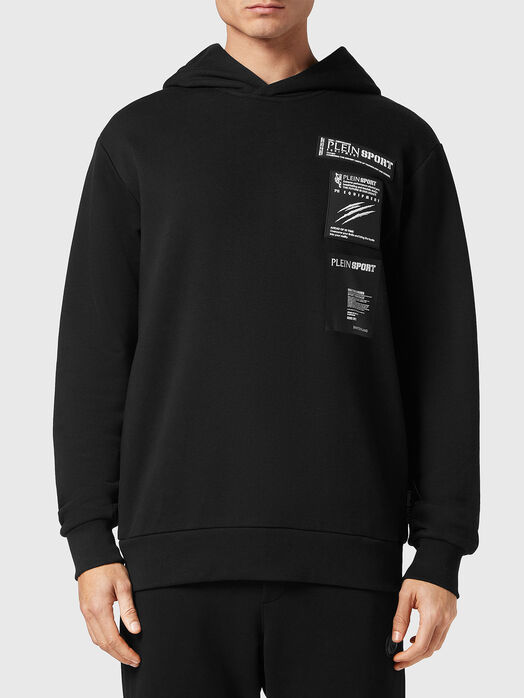 Sweatshirt with contrasting patch