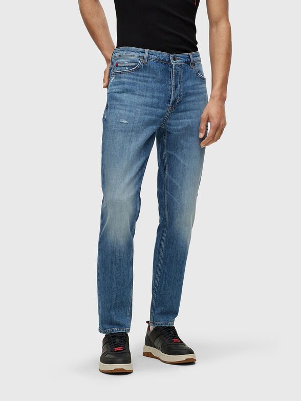 Blue jeans with distressed effect - 1