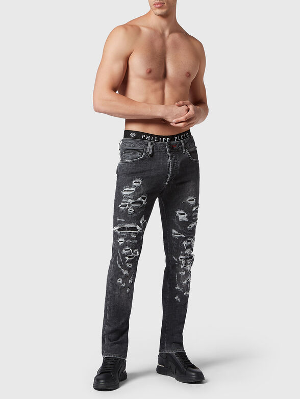Slim jeans with ripped accents - 4