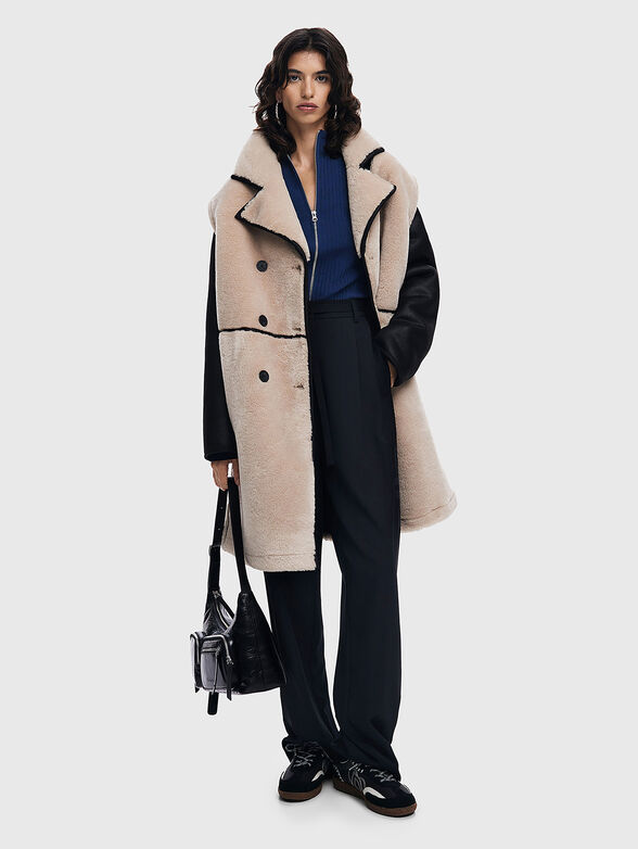 Coat with detachable sleeves - 1