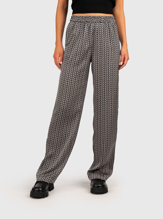 Loose fit trousers with monogram - 1