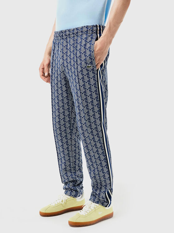 Brown sports trouser with monogram print - 1