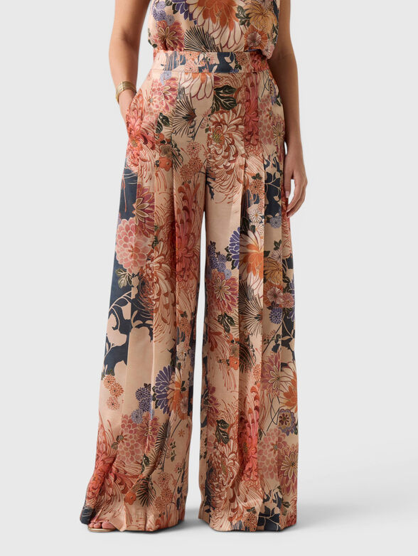 Pleated pants with floral print - 1