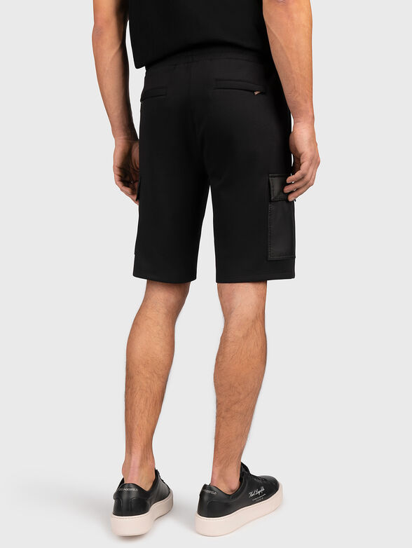 Short black pants with accent pocket - 2