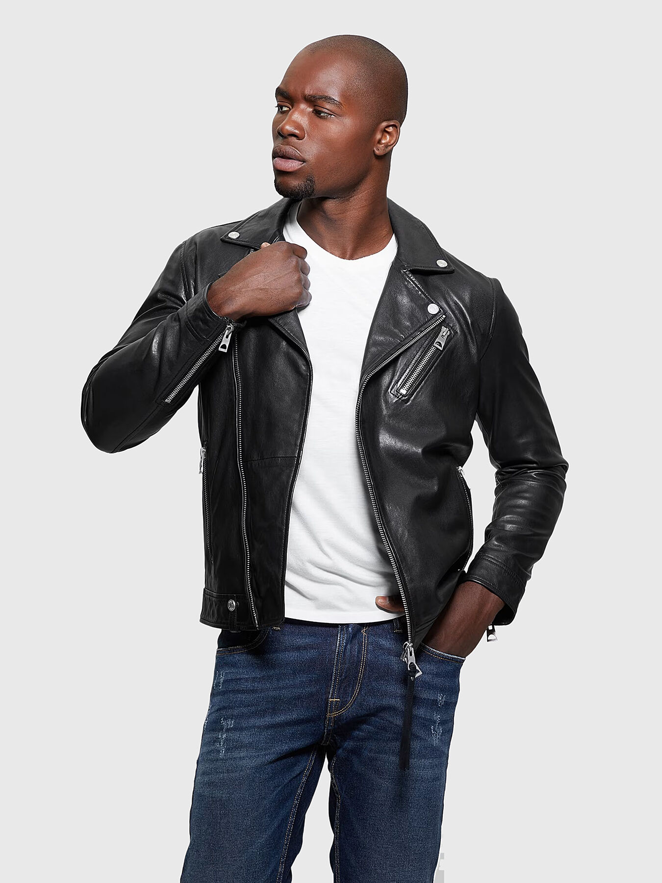 Black leather jacket with metal zips brand GUESS Globalbrandsstore en