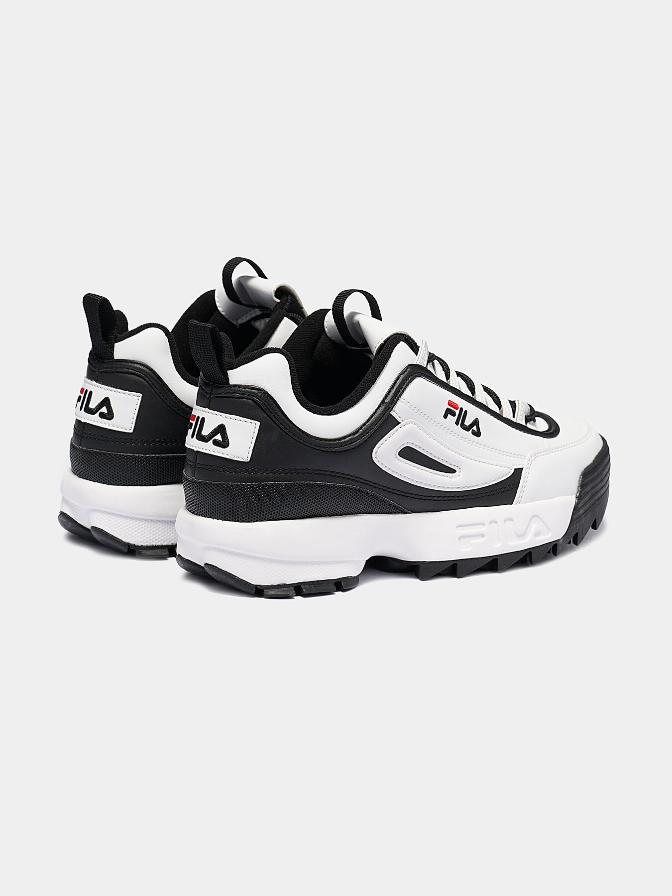 DISRUPTOR CB LOW Black and white runners brand FILA Globalbrandsstore en