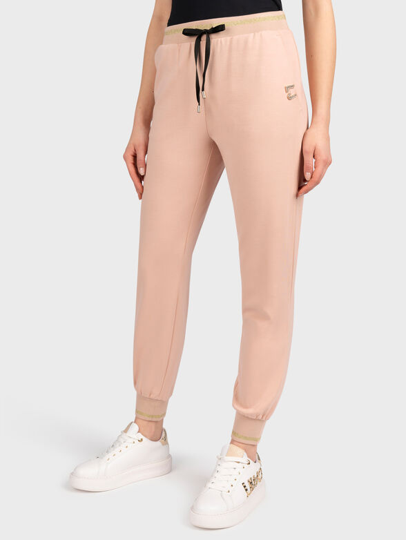 Black sports trousers with shiny logo accent - 1