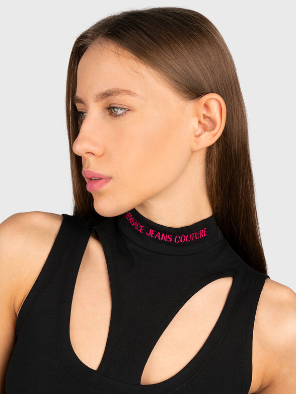 Black top with cut out details and accent back - 3