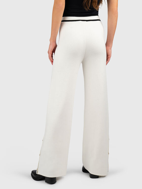 Pants with buttons on the legs - 2