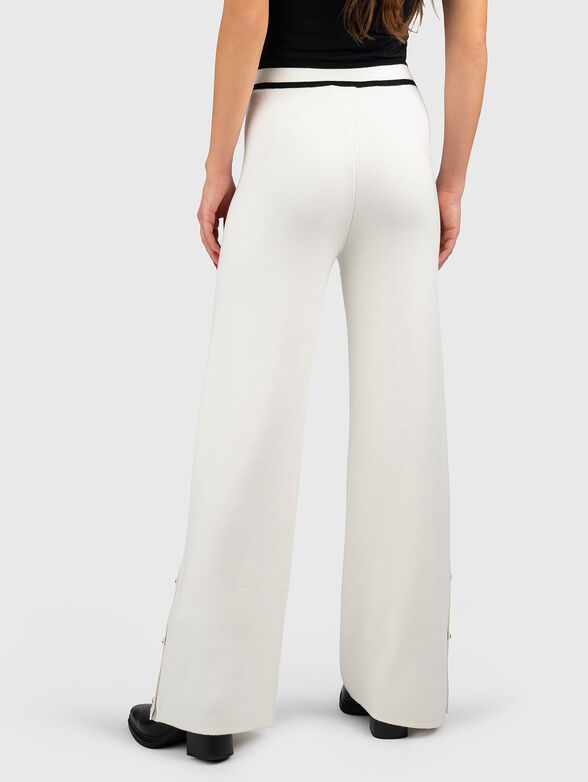 Pants with buttons on the legs - 2