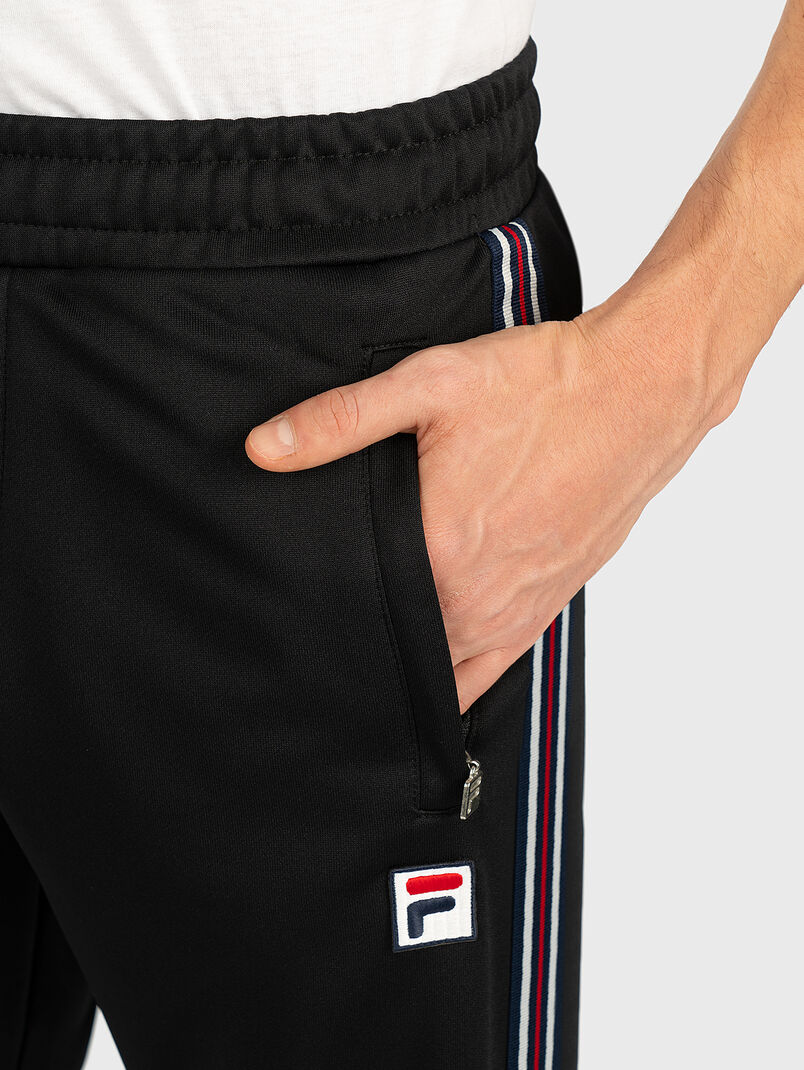 SALIH Track pants in black - 3