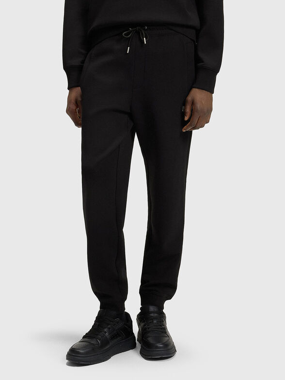 Black sports trousers with ties - 1