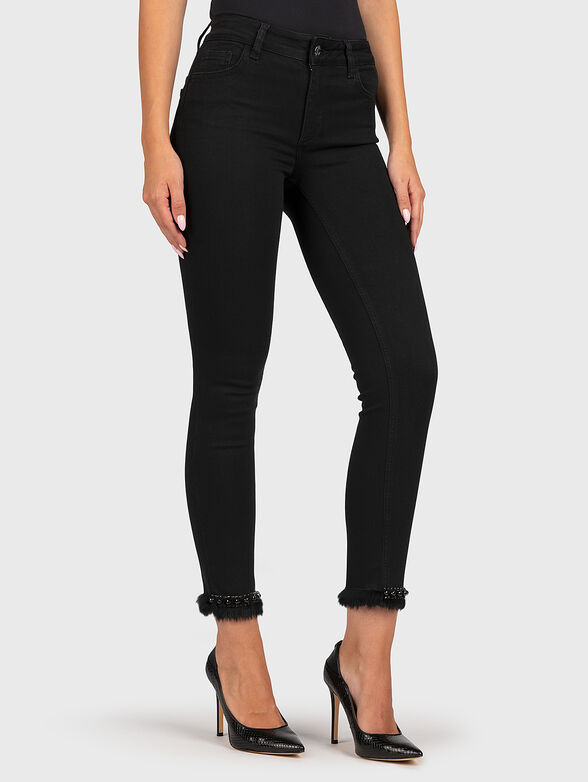 Black high-waisted jeans with hem decorations - 1