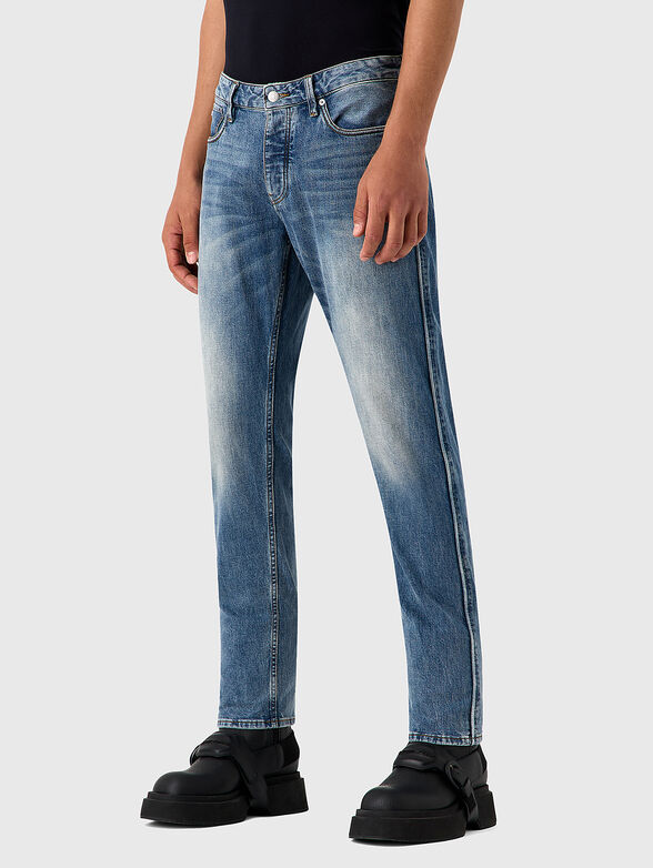 Blue straight jeans with washed effect - 1
