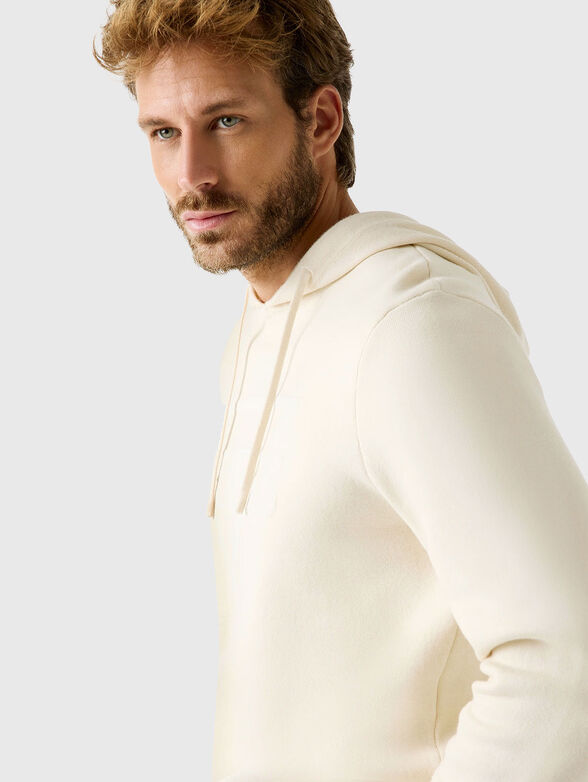 Hooded sweater with embossed logo - 4
