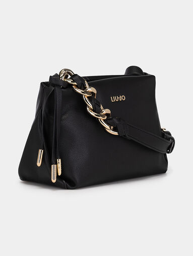 Crossbody bag with an accent chain on the strap - 4