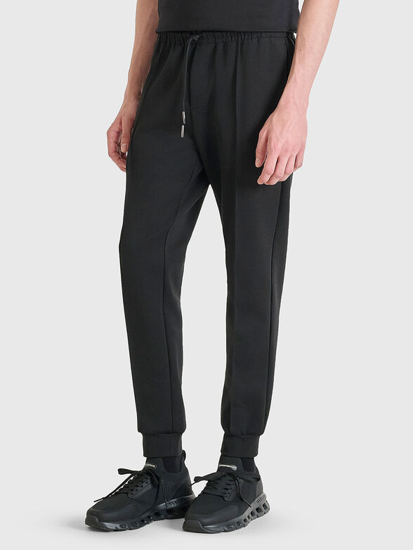 Sport trousers with pockets - 1