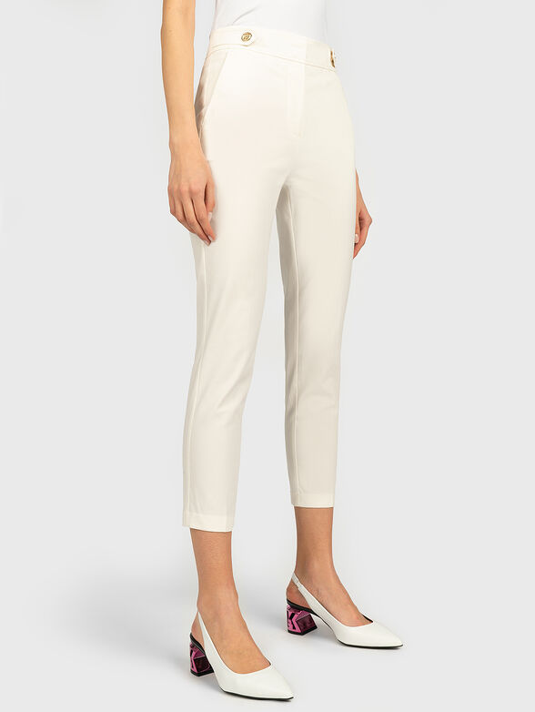Slim trousers in beige color - 1