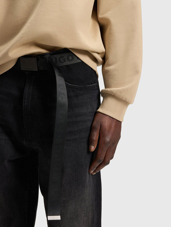 Jeans with washed effect and logo - 3