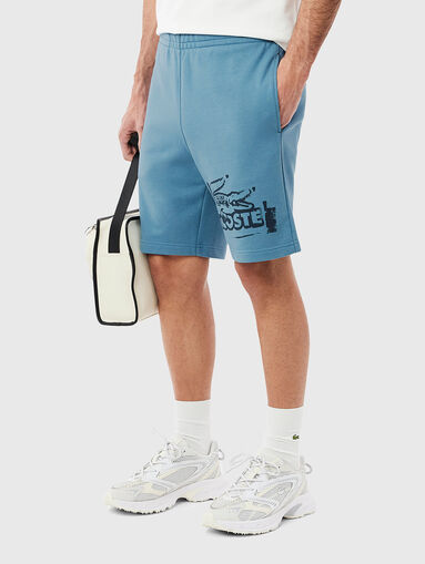 Cotton shorts with logo print in ecru - 3