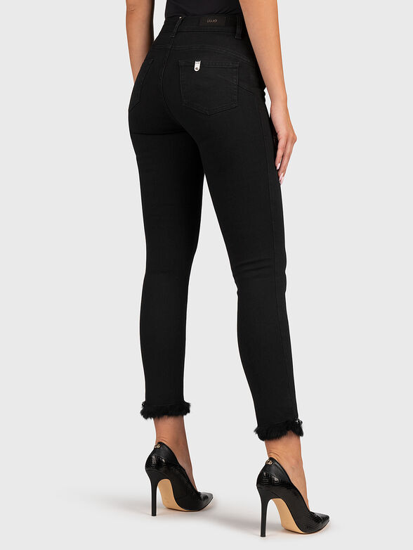 Black high-waisted jeans with hem decorations - 2