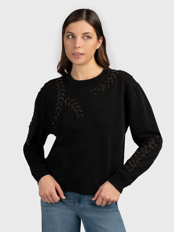 Sweatshirt with floral motifs - 1