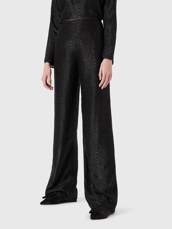 Textured trousers with wide legs - 1