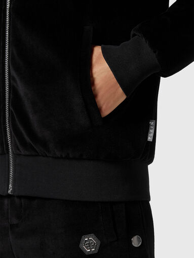 Logo patch sweatshirt in black - 4