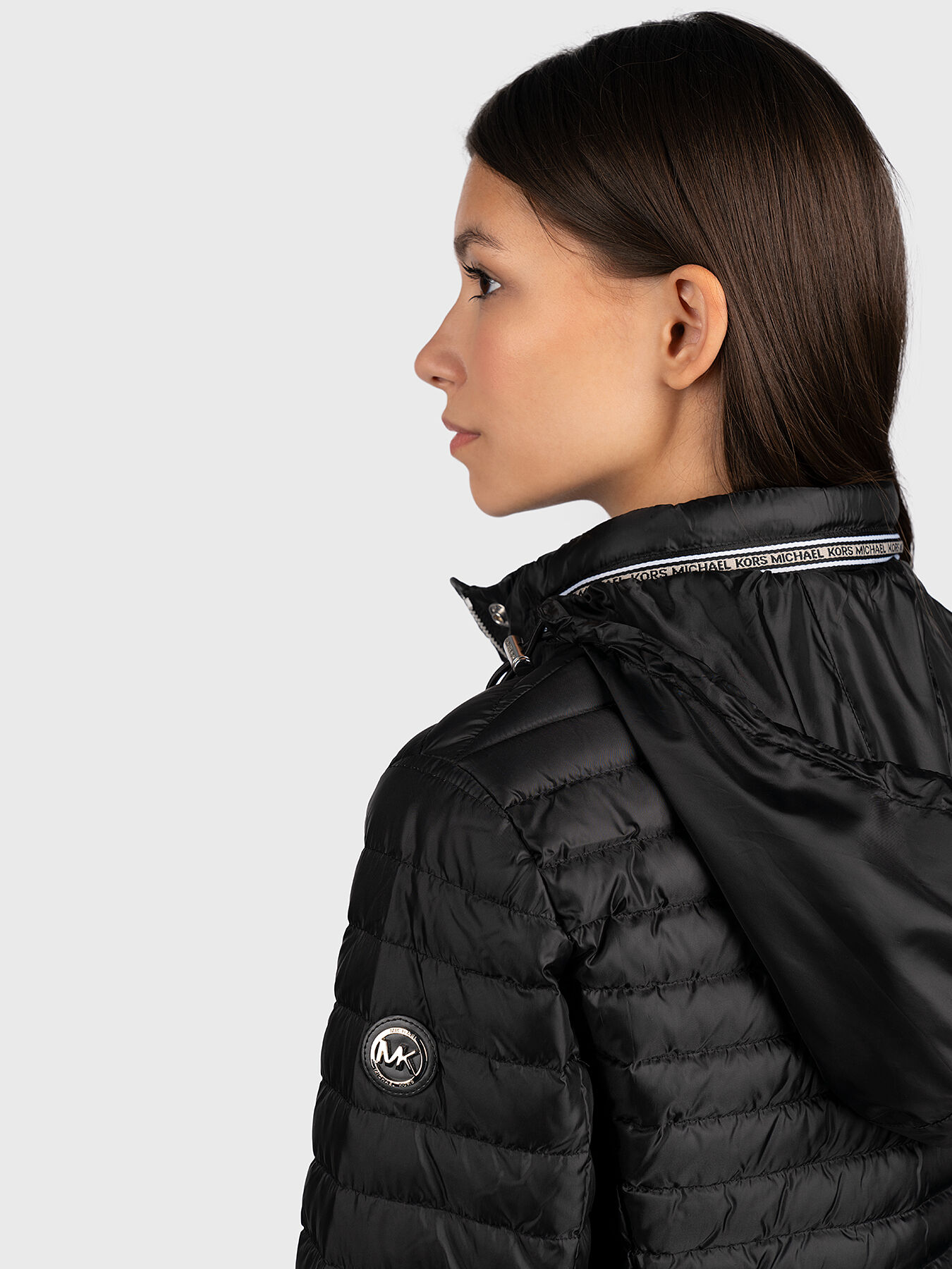 Black jacket with branded belt brand MICHAEL KORS
