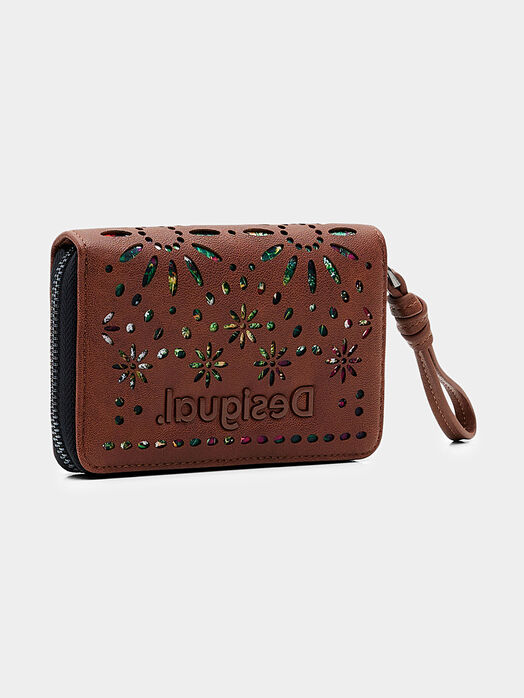 Brown purse with laser perforations