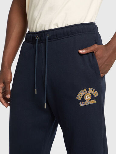 Black sports trousers  with ties at the waist - 4