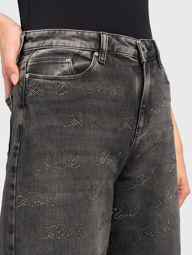 Jeans with monogram of appliqued rhinestones - 4