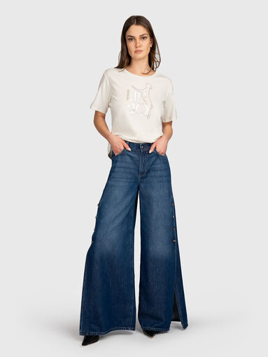 Flared jeans with side slits - 5