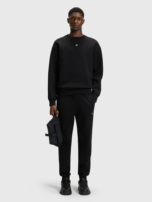 Sweatshirt with oval neckline in black - 2