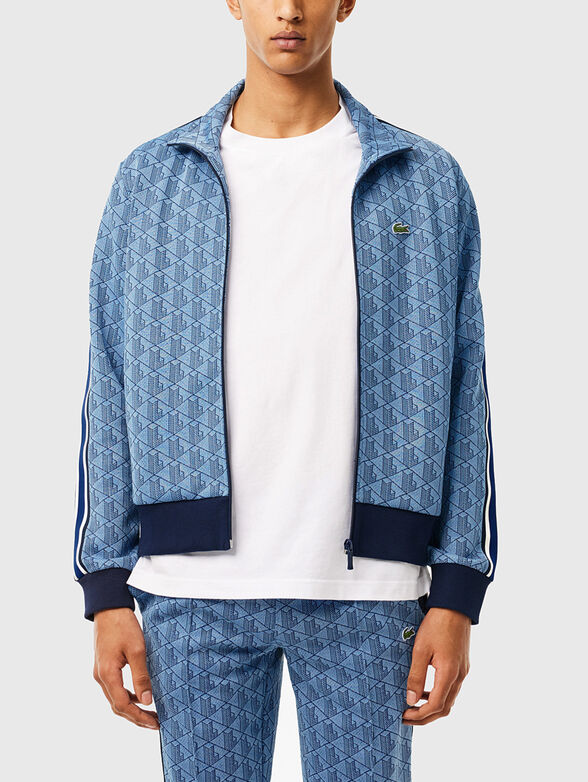 Sweatshirt with monogram print in brown - 1