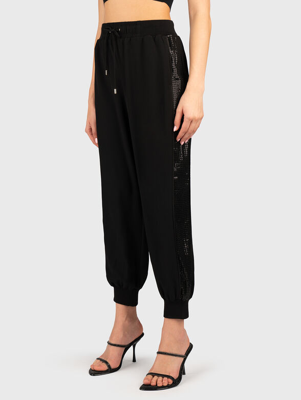 Sports trousers with sequins and logo - 1