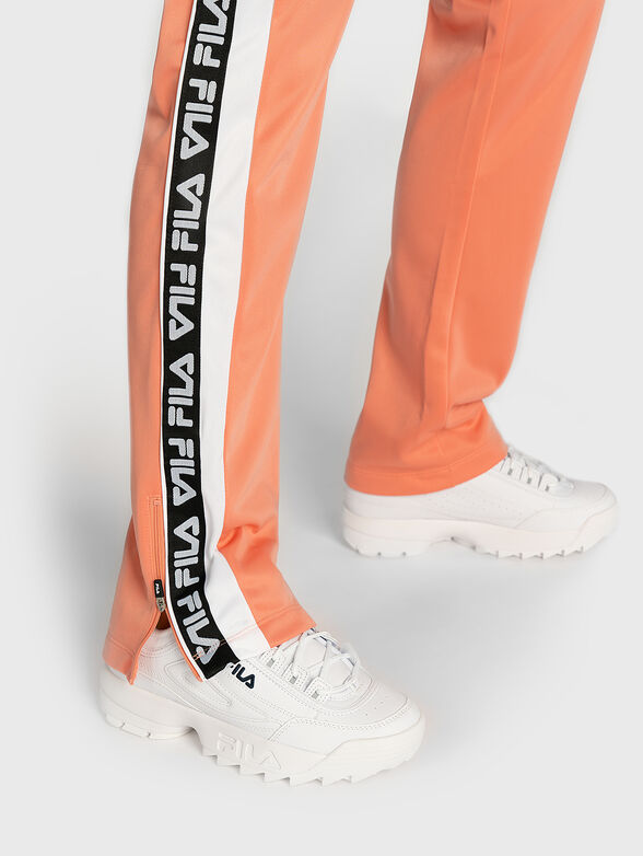 Track pants with branded stripes - 3