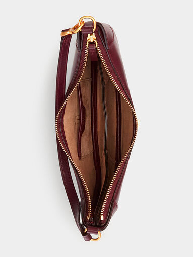 Leather bag in bordeaux color and metal accents - 4