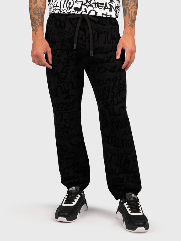 Joggers with textured graffiti print - 1